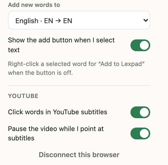 The Lexpad extension menu: the notebook new words go to, the add button switch, and a YouTube section with Click words in YouTube subtitles and Pause the video while I point at subtitles, both on
