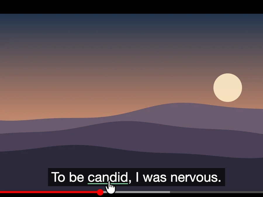 The paused video with the subtitle “To be candid, I was nervous.”: candid is underlined in green under the pointer